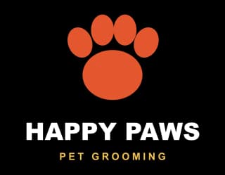Et orange poteaftryk over teksten Happy Paws Pet Grooming